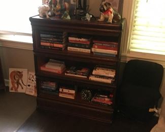 real nice 3 stack barrister bookcase with hidden shelf in the bottom base