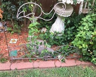 lots of yard art and outdoor decor 
