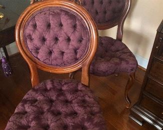 purple tufted parlor chairs wonder why you're looking at them like that