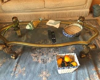 glass coffee table with lion legs