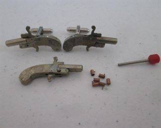 Handcuff Derringer's  (with blank loads) 