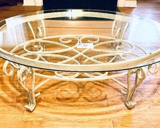 #31- METAL AND GLASS COFFEE TABLE 
46L  X 31  x 17t         $225