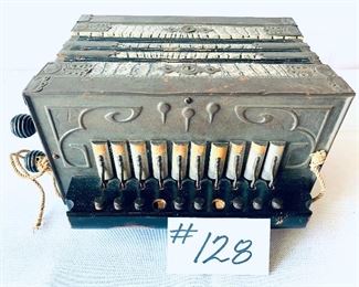 SMALL VINTAGE ACCORDION ( a few buttons missing)  $75