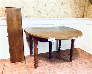 DROP LEAF TABLE WITH FOUR LEAVES 
TOTAL LENGTH 7’11” 
$450