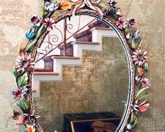 VINTAGE OVAL MIRROR WITH METAL FLOWERS. 19w x 35”t  $250