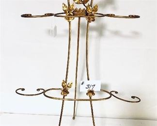 Metal stand       19 1/2 inches wide 37 inches tall       $95