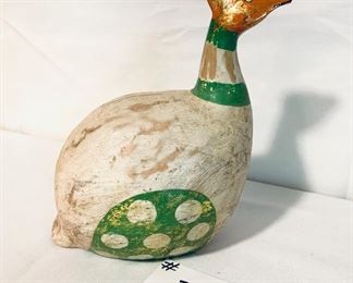 Carved painted wood bird    8 inches wide by 10 inches tall.     $30