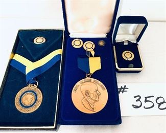 Lot of Paul Harris medals and pins  $45