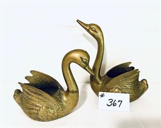 Pair of brass swans 8 inches tall and 11 inches tall $40