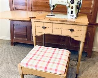 Vintage singer sewing machine and stool $125