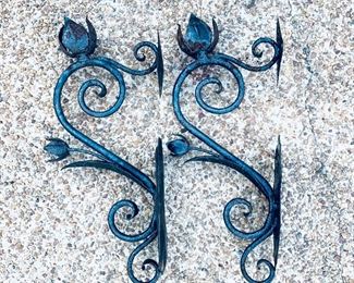 #603- DECORATIVE METAL WALL SCONCES. Some rust 
24” t.    $45 pair. 