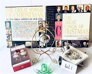 CHRISTMAS COLLECTION. 
2 records, ornament holder, Santa spreaders, 4 CDs, candle holder, 2 bells. 
Set $32 