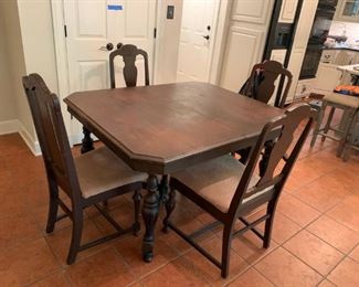 #1 Wood Cross Leg Table w/4 chairs (all as is) 43x53x30 $75.00
as is chair missing 1 arm and have 2 more piece chairs too.