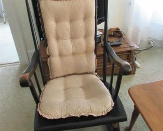 Stenciled Rocking chair with cushions.  