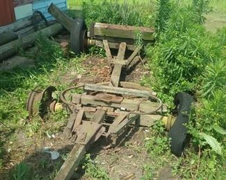 Base of old farm wagon. You will need a rope and a truck to pull it out. 