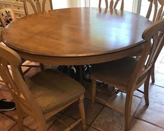 60" Round Wood Kitchen Table w/Wrought Iron Base       7 Armless Chairs,  $700