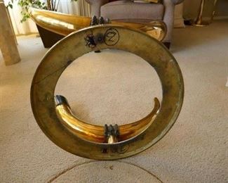 $595 - Brass Tusk Coffee table with glass top. 36" diameter, 15" high. 