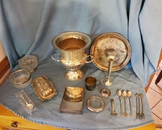 P-LR-142    $35      Butter dish silver plate, urn Leonard Electroplated silverplate , platter, bud vase silverplate, cup 1847 Rogers Bros. silverplate, Sterling silver coaster, small candle holder sterling silver, Forks and spoons possibly silver, Two spoons silver plated, Reed and Barton silverplate cedar inside box, William rogers platter silverplate, Italian pedestal bowl silverplate, crystal silverplate bowl