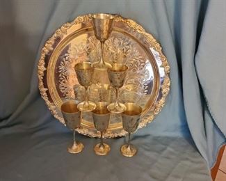 P-LR-143  $45      Sheridan Platter Electroplated over brass 20" diameter, Three goblets hammered electroplated silver, Four wine glasses