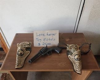P-G-16   $25   Lone Ranger Toy Pistols and holsters