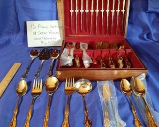 P-K-158   $65   16 Place Settings   Gold Flatware