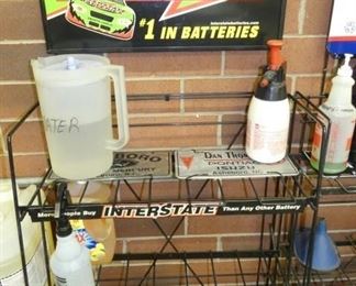 INTERSTATE BATTERY RACK W/SIGN 