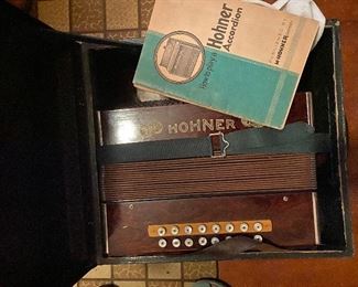 Hohner accordian with case and instructions
