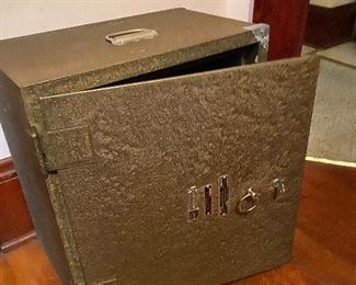 Vintage metal safe with key lock