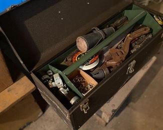 Metal toolbox filled with tools