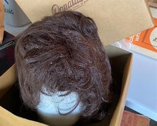 Wig and foam head in original Donaldson's hat box.