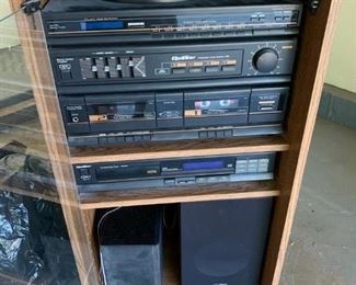 #3	Quasar Stereo	
Stereo cabinet Quasar integrated audio system CS9 includes turntable, equalizer, double cassette deck, compact disc player and 2 speakers with cabinet 38.5"L x 19W x 17.5D	$99.00 ALL
