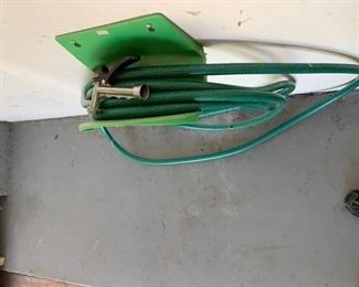 #79           Hose with spray nozzle and wall hanger                           $12