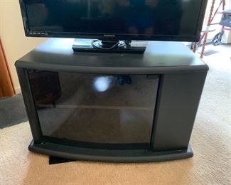 #31	TV STAND missing connection piece on bottom of glass 21"L x 33"W x 30.5 D	$15.00
