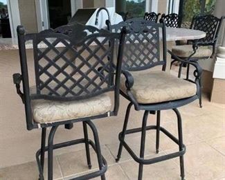 Less than 6 mos. new! 5 Iron Swivel Bar Stools.