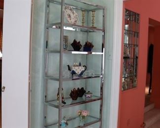 MID-CENTURY MODERN CHROME ETAGERE WITH GLASS SHELVES IN THE STYLE OF MILO BAUGHMAN