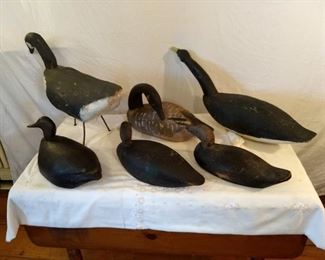 Duck Decoys with movable/rotating necks (3), and various Geese decoys (2) and one standing goose decoration.