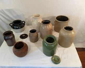 Various ceramic clay pots, pitchers, and vases