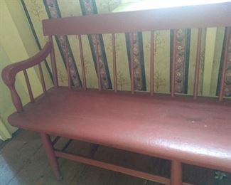 Red wooden bench able to seat 5 people (or more) 91"L x 15" D x 31"H