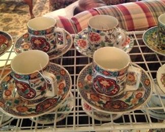 Many cups & saucers