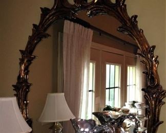 Ornate oval mirror