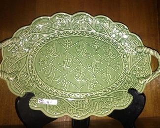 One of several green plates/platters
