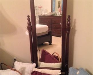 Floor mirror; decorative pillows