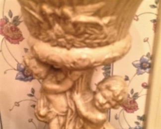 Cherub urn - filled with shells