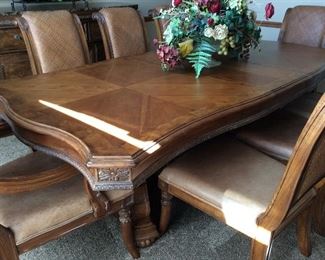 Walter E Smith dining room set 8 ft with leave and 44 wide 8 chairs leather. Price 1300.00