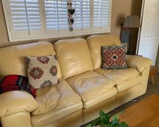 "Comfy" leather sofa with kelim pillows