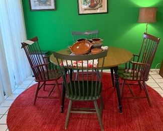 Vintage Dining table and red wool area rug 