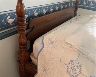A very old and original antique 4 poster bed.  So pretty