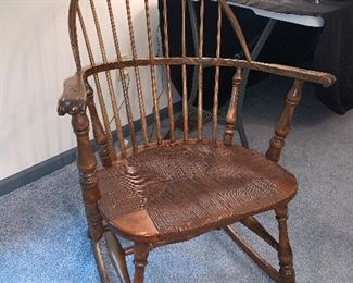 Very old antique rocking chair.  Nice piece!!