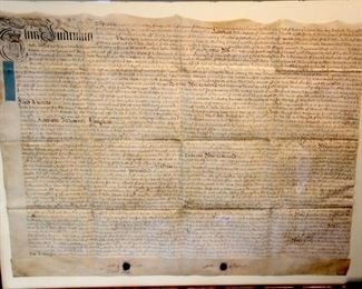 Indenture document dated “May 15, in this 8th year of the reign of our sovereign Lord George II possibility 1735.   Hand carved hardwood professionally framed. A deed with seals and tax stamps written on parchment in English.    32"x40" $ 225.00