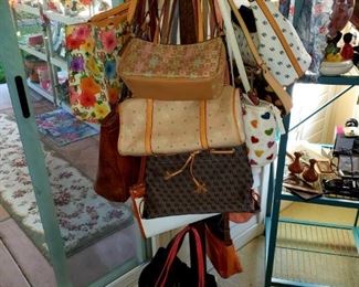 Tons of Dooney Bourke Purses, plus many more high-end Purses and Wallets